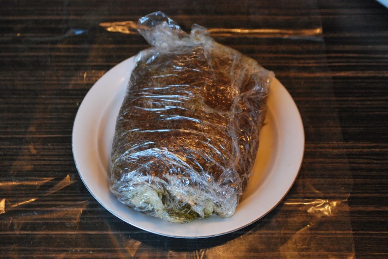 Notice the yellow nut oil extracting